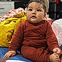 baby, child, infant, sitting, indoors, blanket, clothing, foot, hand, face, cheeks, expression, furniture, room, soft, warm, cute, portrait, young, cozy