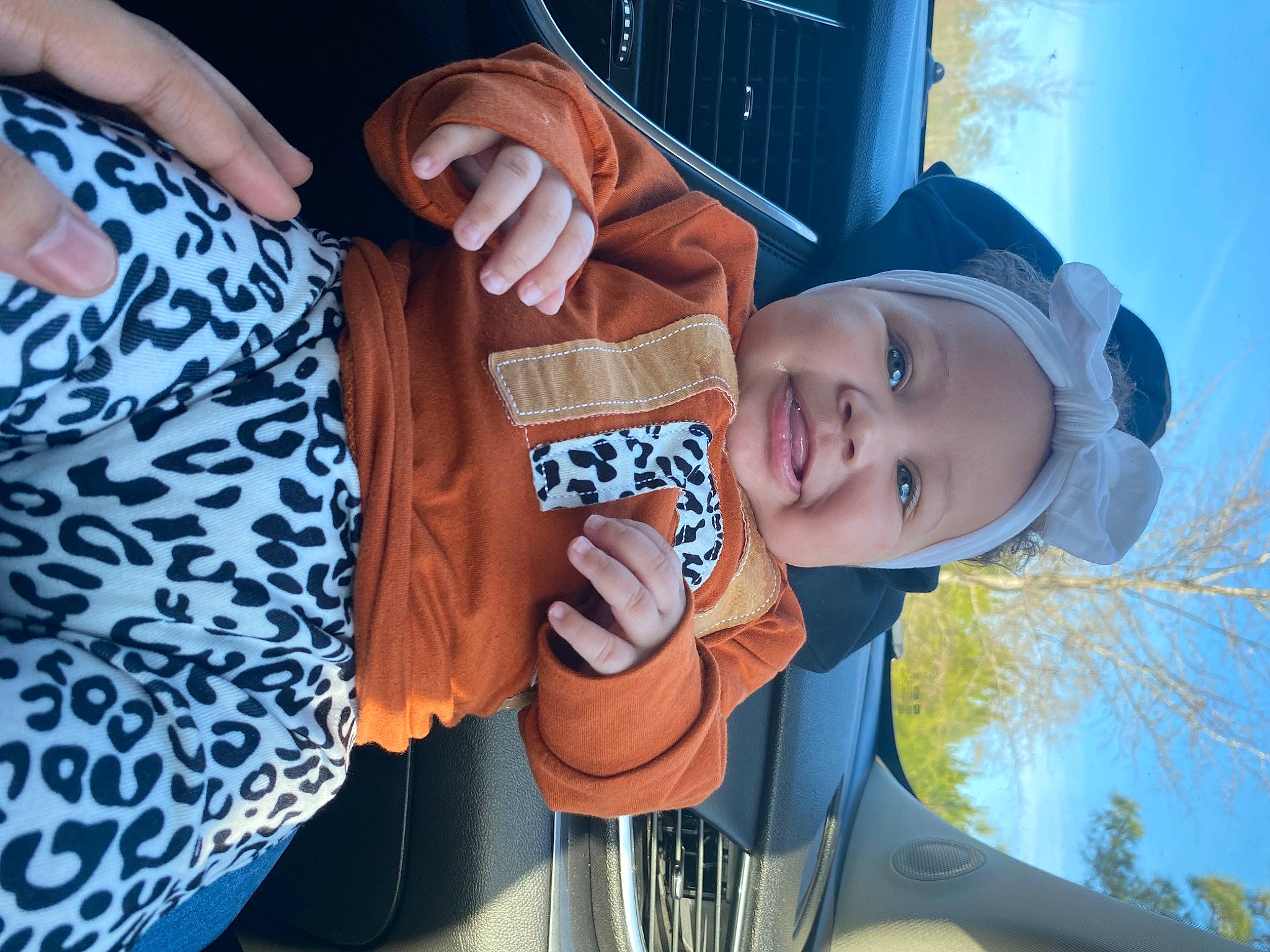 Jaylani is registered to the contest to win money with this photo: azure, child, cool, electric_blue, eyewear, fashion_accessory, finger, fun, gesture, hand, happy, hat, headgear, headwear, leisure, person, sky, smile, sun_hat, toddler