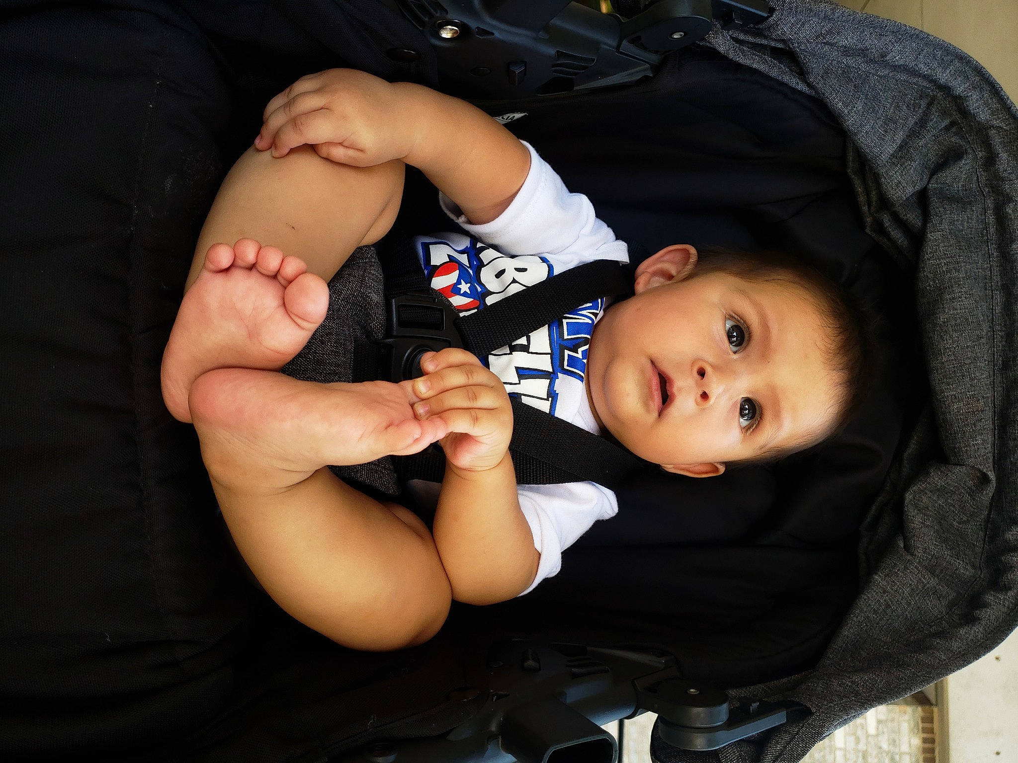 Iker joined the competition — help win amazing prizes! arm, baby, baby_carriage, baby_products, baby_safety, baby_toddler_clothing, cheek, child, comfort, elbow, eye, finger, gesture, hand, lap, person, sitting, sleeve, surprise, thigh