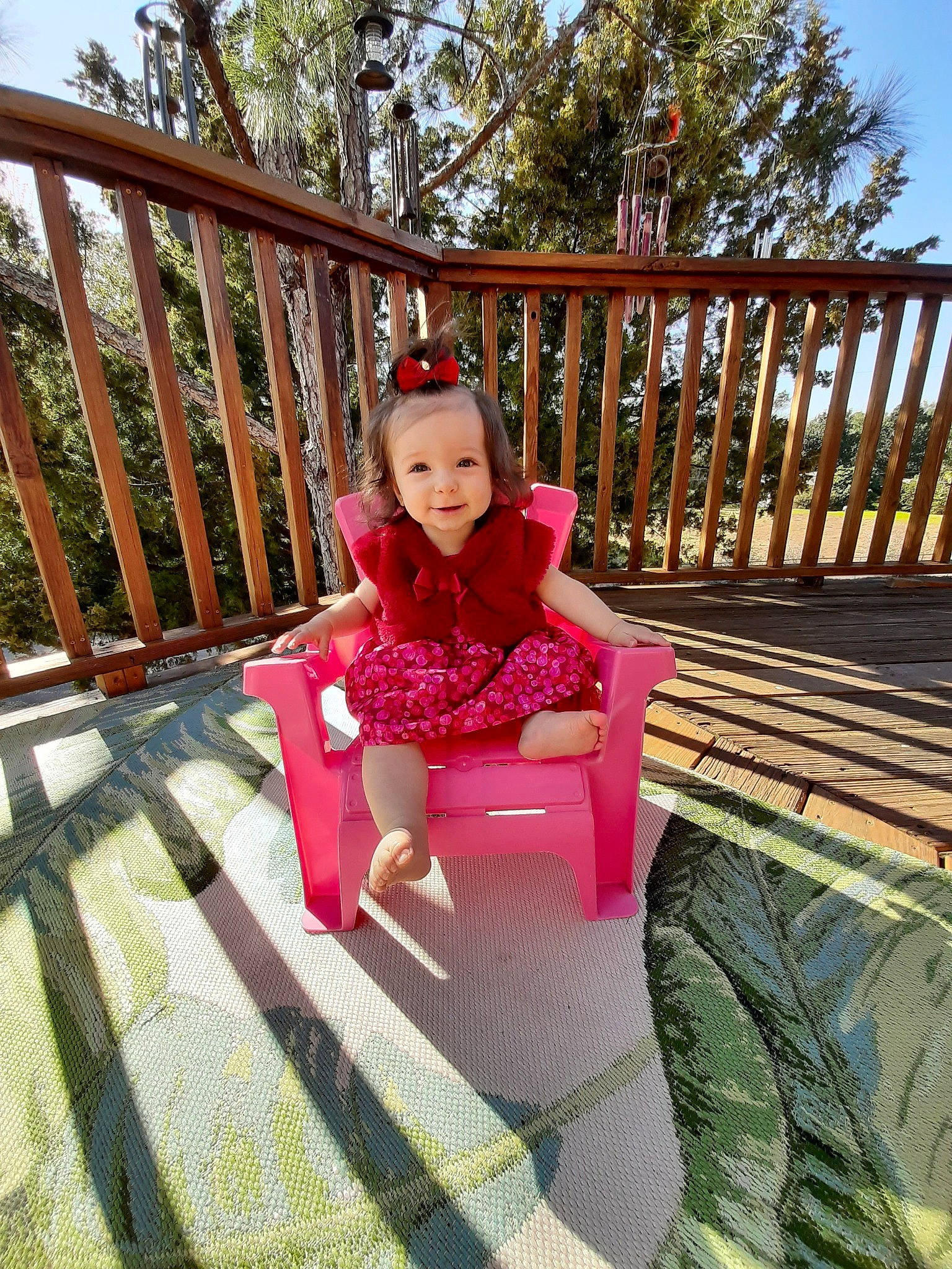 Allura is registered to the contest to win money with this photo: chair, child, fawn, furniture, garden, grass, home, house, joy, leisure, magenta, person, pink, plant, sitting, spring, summer, tree, vacation