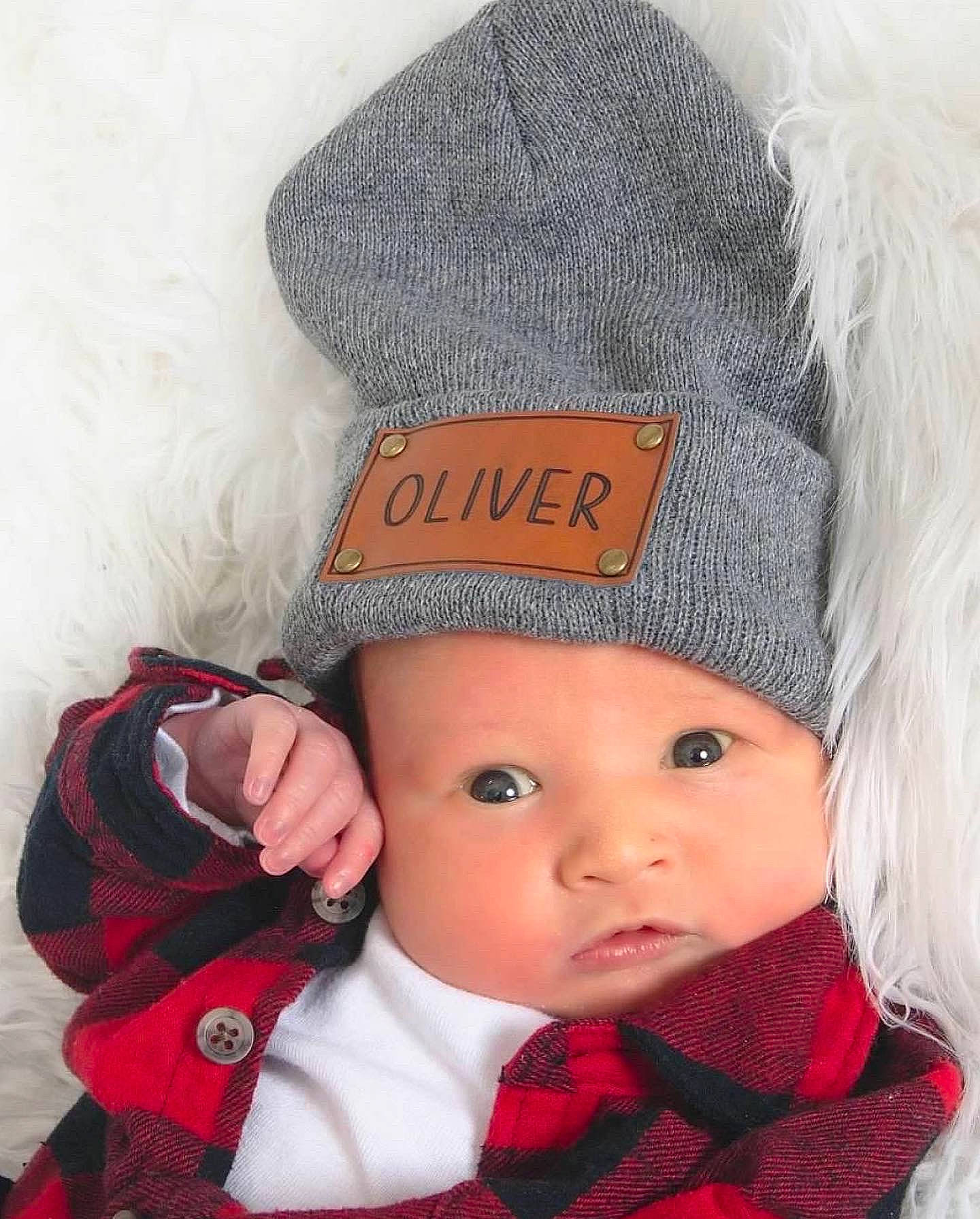 William Oliver Shane is registered to the contest to win money with this photo: baby, baby_toddler_clothing, cap, clothing, costume_hat, facial_expression, hat, head, headgear, headwear, knit_cap, lip, organ, outerwear, person, skin, sleeve, tartan, textile, tie