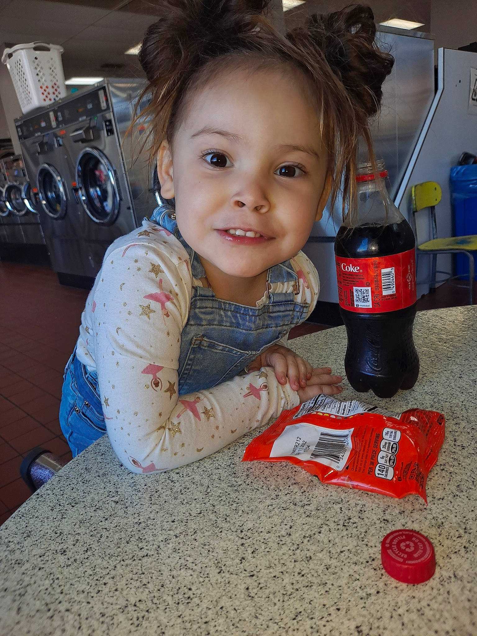 Izabella joined the competition — help win amazing prizes! audio_equipment, bottle, carbonated_soft_drinks, carmine, child, cola, drink, drinkware, flooring, fun, happy, joy, person, plastic_bottle, play, sitting, skin, smile, soft_drink, toddler