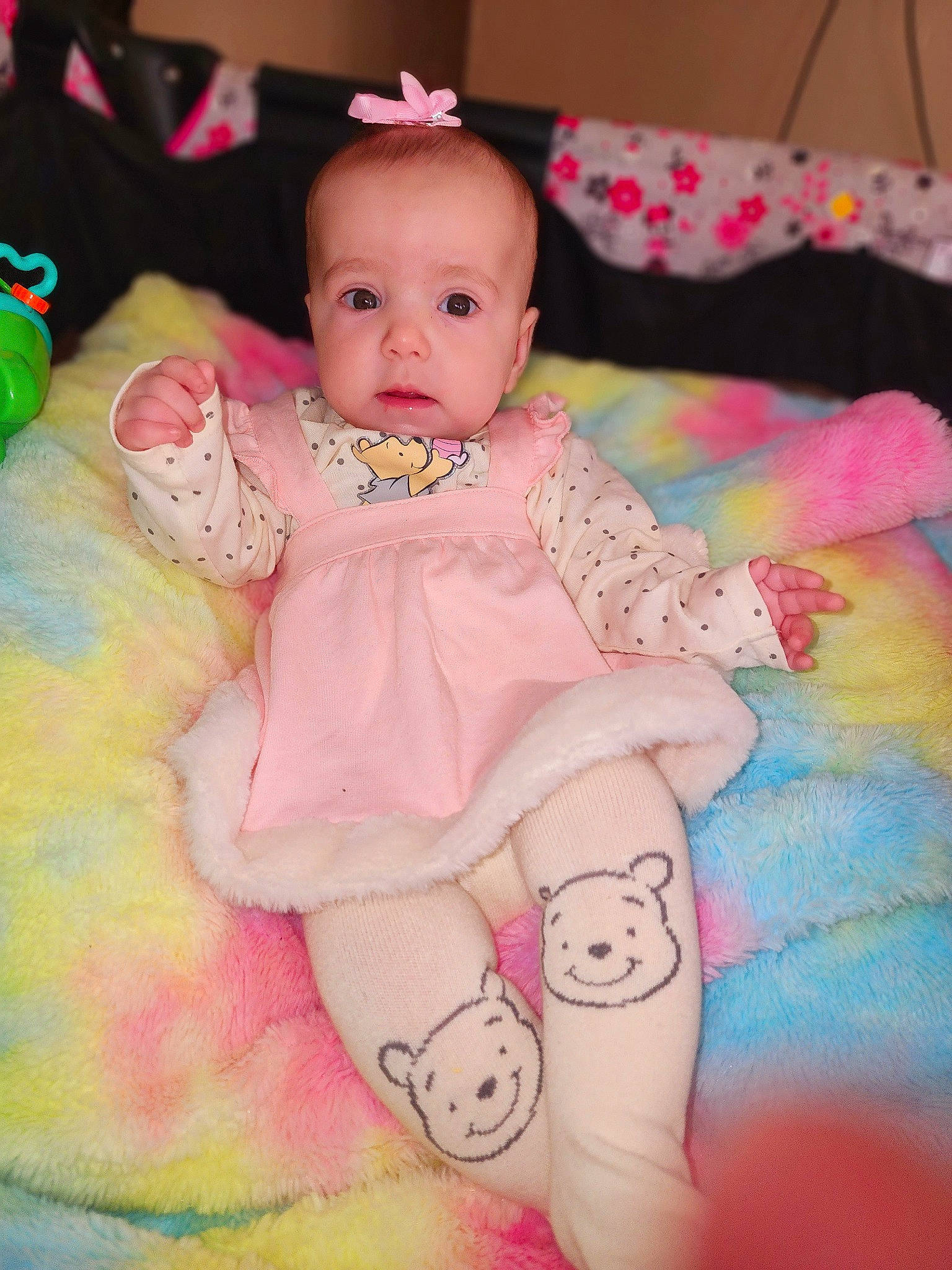 Brooklynn is registered to the contest to win money with this photo: art, baby, baby_products, baby_toddler_clothing, cheek, child, fun, happy, head, human_leg, knee, magenta, pattern, person, pink, purple, sitting, skin, sleeve, sock