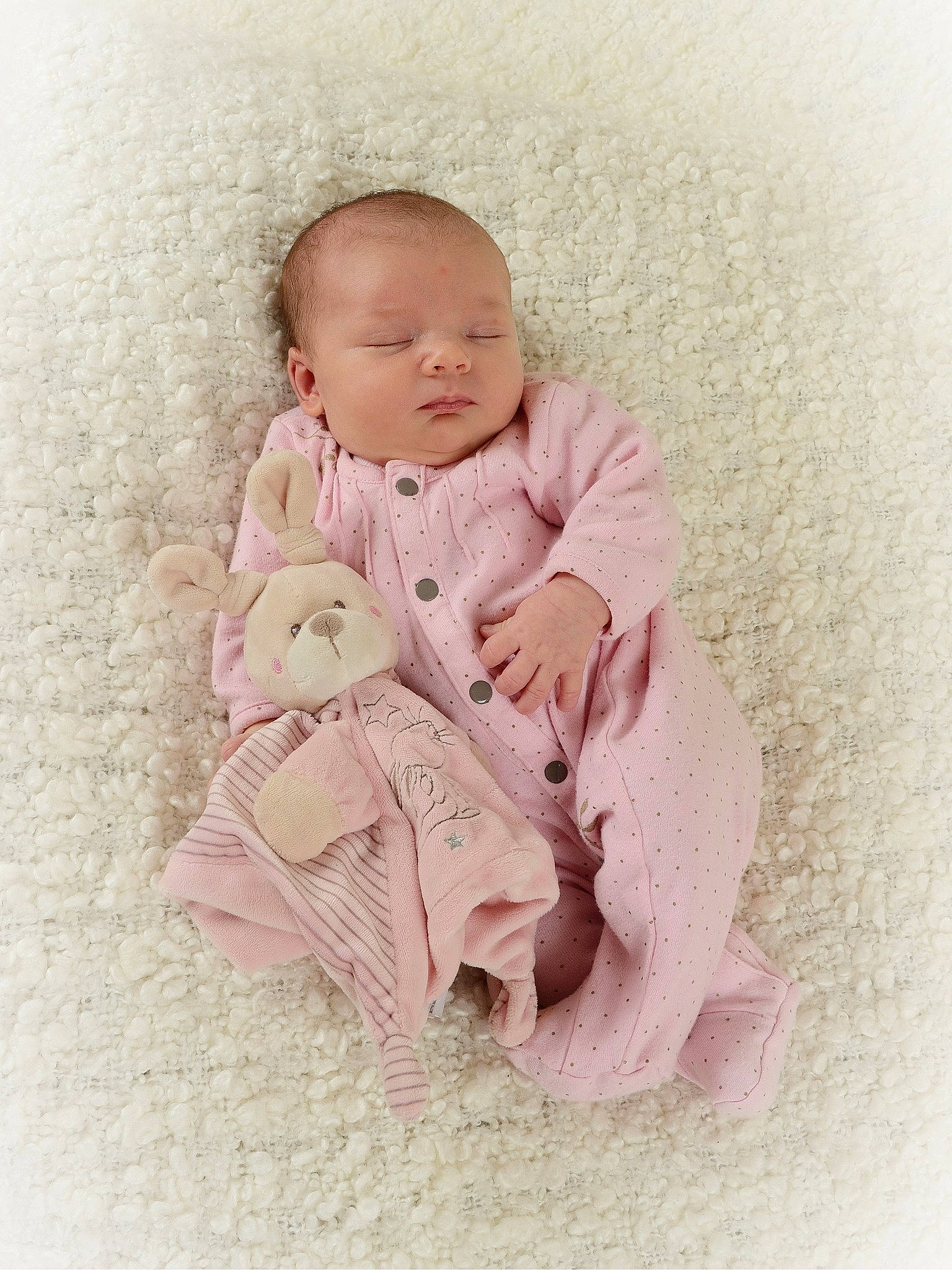 Madyson participe au concours pour gagner de l'argent avec cette photo : baby, baby_products, baby_sleeping, baby_toddler_clothing, blanket, cheek, child, linens, outerwear, person, photography, pink, product, skin, textile, toddler