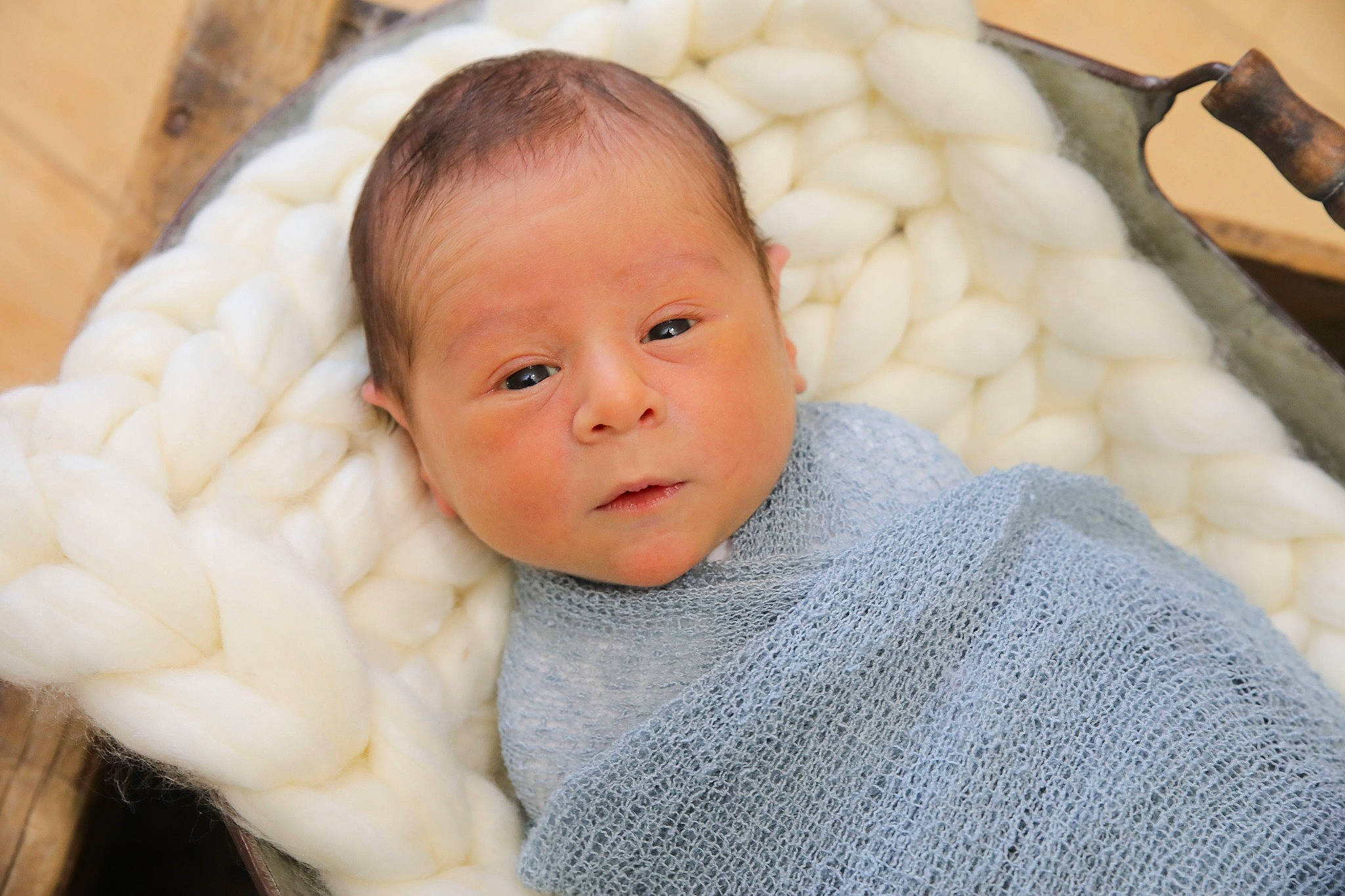 Henry is registered to the contest to win money with this photo: baby, baby_toddler_clothing, cheek, child, chin, comfort, eyelash, facial_expression, fur, gesture, happy, linens, nose, outerwear, person, skin, sleeve, thumb, toddler, wool