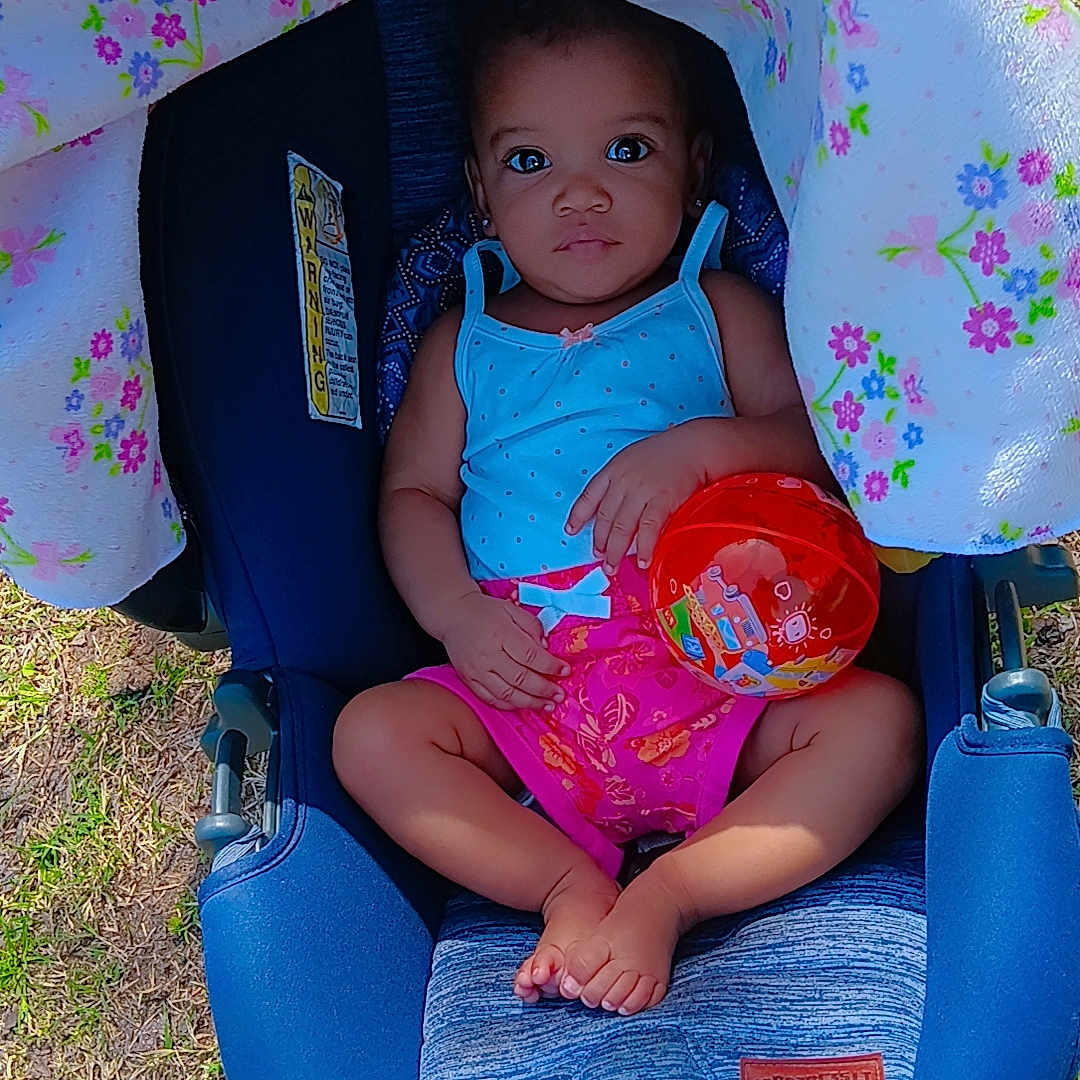 Zendaiah is registered to the contest to win money with this photo: baby, car, clothing, cushion, dress, face, food, furniture, grass, hat, head, homedecor, person, photography, portrait, summer, sweets, toy, transportation, vehicle