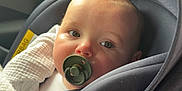 Hugo joined the competition — help win amazing prizes! baby, blanket, candid, car_interior, car_seat, child, clothing, comfort, face, indoors, infant, pacifier, portrait, safety, seat, seatbelt, soft_light, transportation, window, young_child