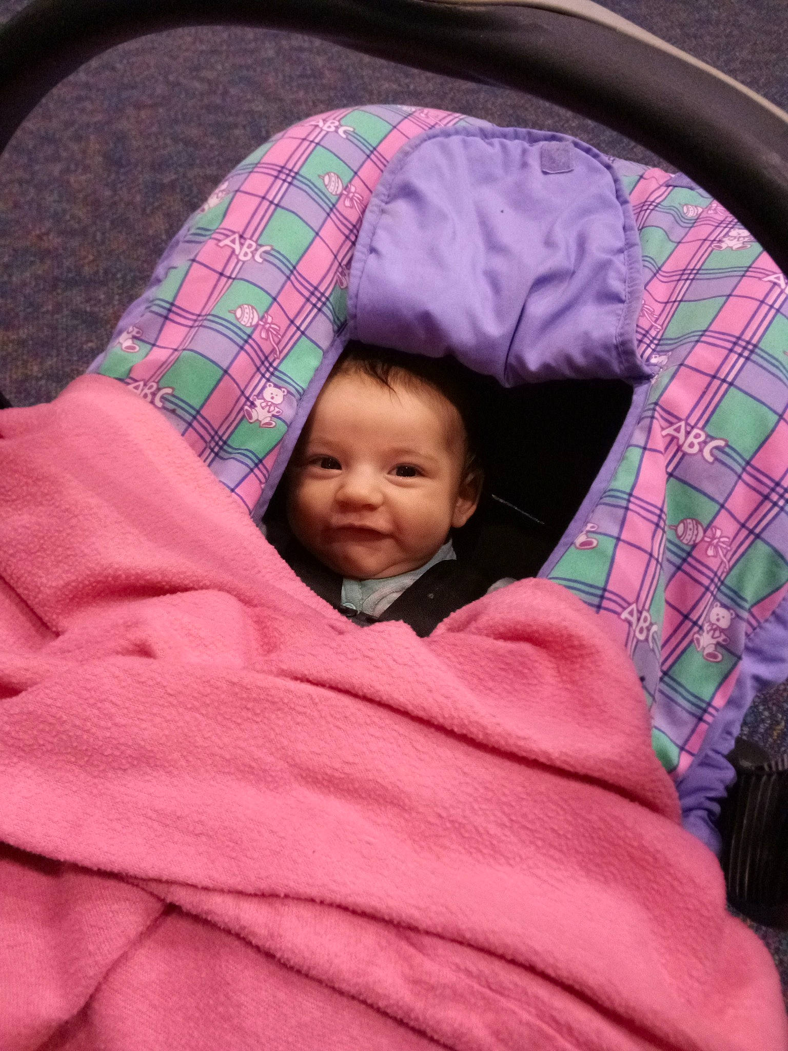 Nevada is registered to the contest to win money with this photo: baby, cheek, child, design, pattern, person, pink, plaid, skin, tartan, textile, toddler