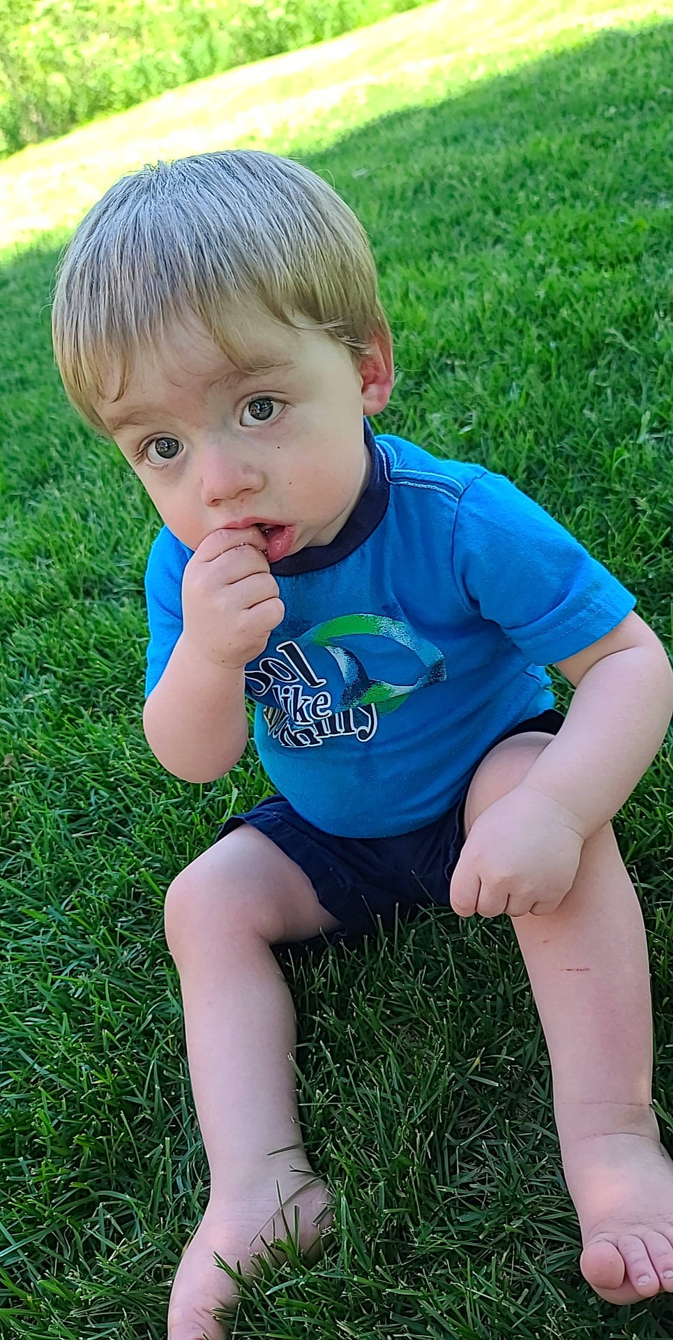 Emrys joined the competition — help win amazing prizes! baby_toddler_clothing, blue, cheek, eye, face, fun, grass, grass_family, green, hair, hand, happy, head, human_body, leg, meadow, people_in_nature, person, skin, summer