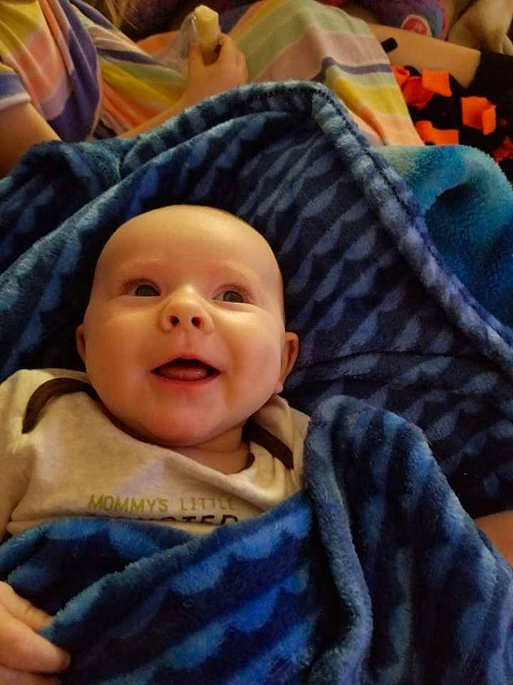 Maverick is registered to the contest to win money with this photo: baby, baby_laughing, baby_toddler_clothing, cheek, child, chin, comfort, eyebrow, facial_expression, happy, headgear, headwear, iris, lip, mouth, nose, person, skin, sleeve, smile