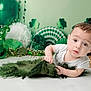 Tucker joined the competition — help win amazing prizes! baby, infant, child, green, st_patricks_day, shamrock, balloon, hat, celebration, decoration, curious, white_surface, cloth, face, portrait, holiday, festive, cute, person, indoor