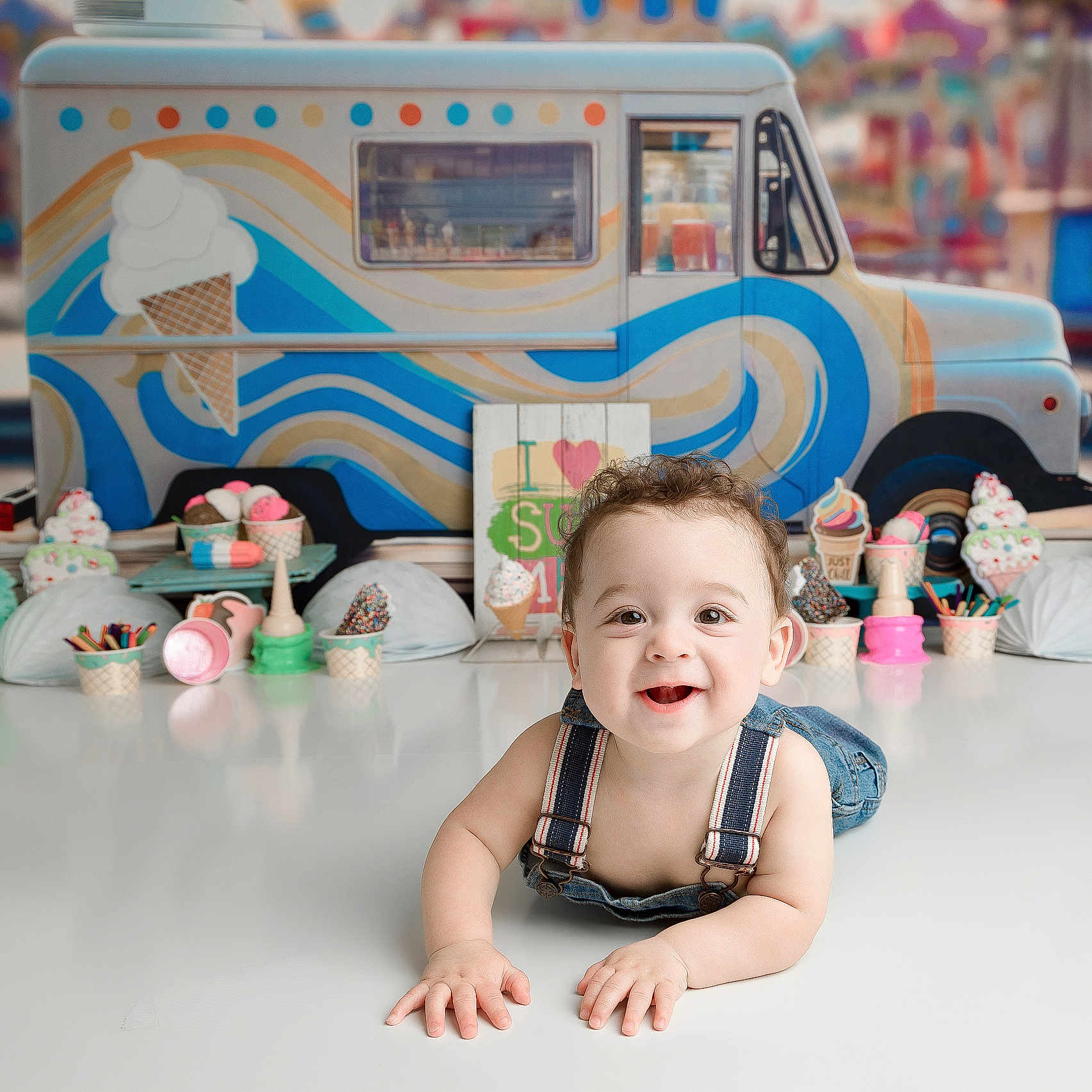 Wolftyn joined the competition — help win amazing prizes! baby, background, child, colorful, cute, decorations, denim_overalls, face, food_theme, happy, ice_cream, indoor, infant, playful, portrait, smiling, studio_photo, summer, table, toy
