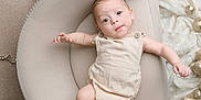 Wolftyn joined the competition — help win amazing prizes! baby, infant, child, cushion, chair, disco_ball, decorations, golden_ornaments, white_blanket, beige_outfit, cute, portrait, indoor, festive, celebration, relaxed, smiling, small_child, looking_at_camera, cozy
