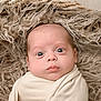 baby, infant, wrapped, blanket, face, wide_eyes, expression, curious, skin, head, laying, texture, rug, soft, closeup, portrait, newborn, indoors, cute, child