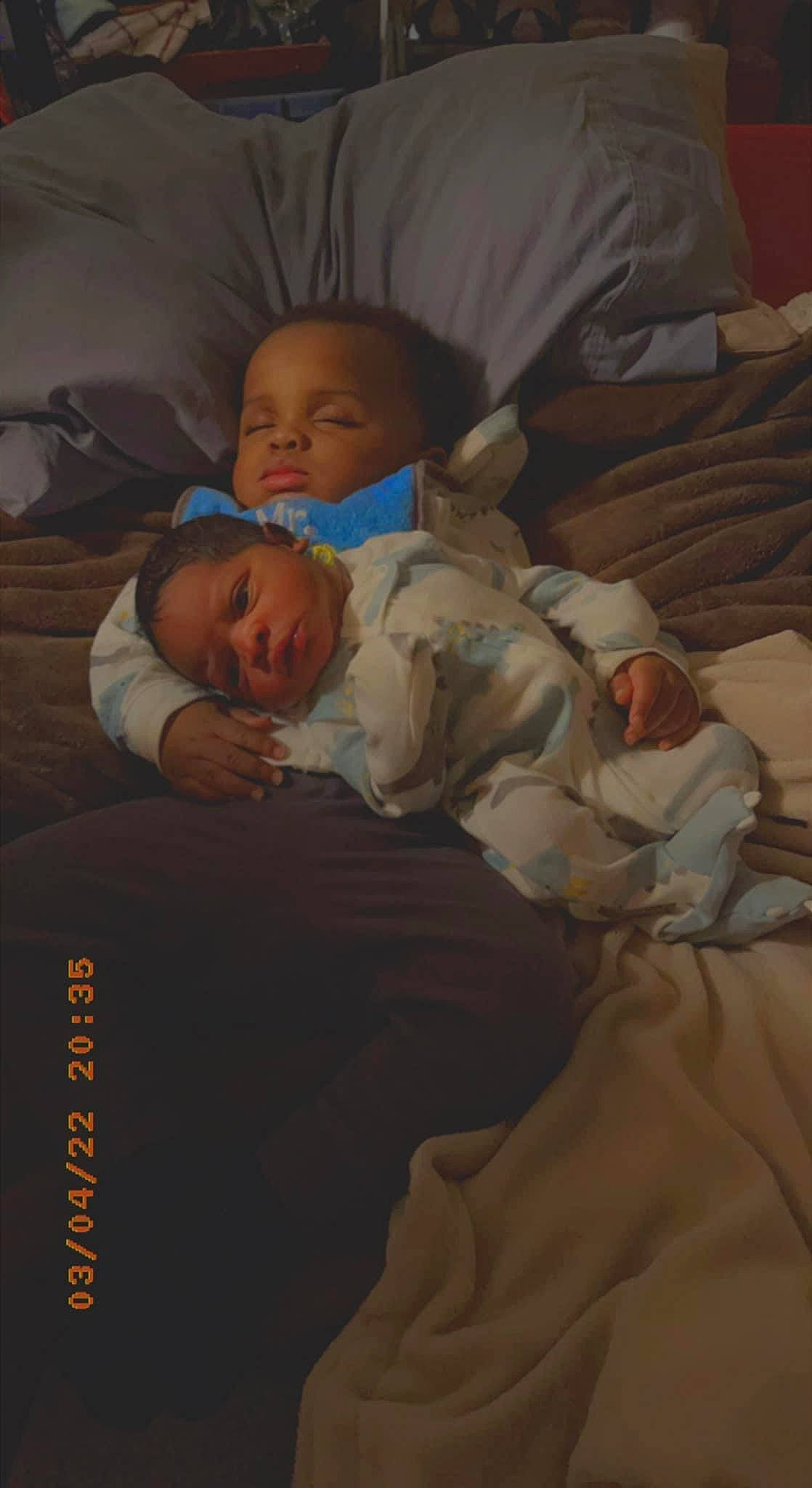 Laveon Holloman joined the competition — help win amazing prizes! art, baby, baby_products, baby_sleeping, baby_toddler_clothing, bedding, bedtime, cheek, child, comfort, face, linens, mouth, nap, person, room, sitting, sleep, toddler, wood