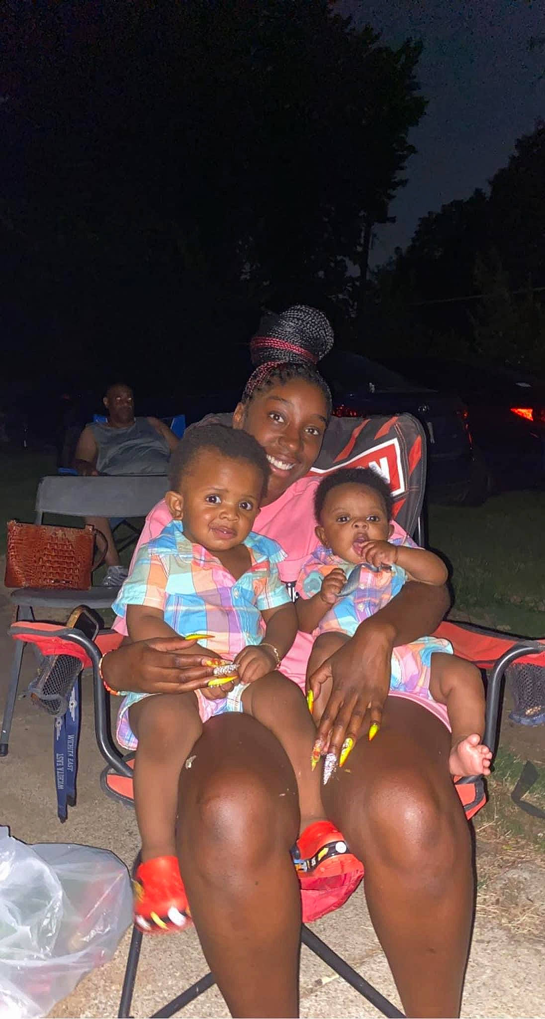Laveon Holloman joined the competition — help win amazing prizes! chair, child, event, fun, happy, human_leg, joy, lap, leg, leisure, magenta, midnight, muscle, people, person, pink, shorts, sitting, t_shirt, thigh