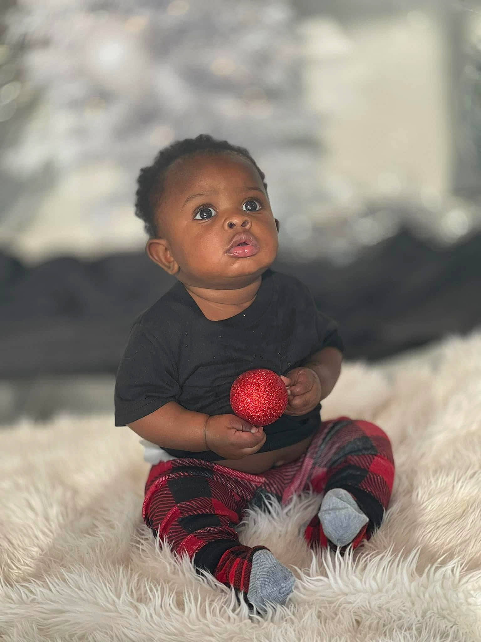 Jamylen Holloman is registered to the contest to win money with this photo: baby_toddler_clothing, ball, carmine, cheek, child, flash_photography, flooring, foot, football, fun, grass, happy, human_leg, people_in_nature, person, portrait_photography, sitting, skin, toddler, toy