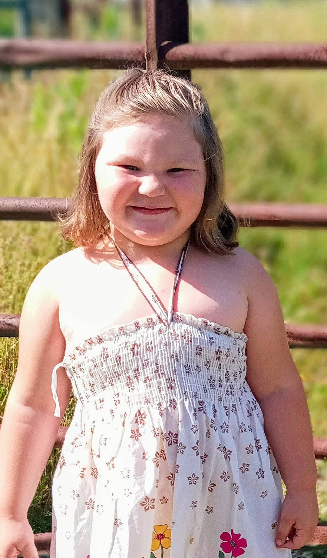 Aliyah joined the competition — help win amazing prizes! blond, brown_hair, child, fence, fun, grass, happy, head, jewellery, joy, laugh, leisure, necklace, pattern, people_in_nature, person, skin, sleeve, smile, summer