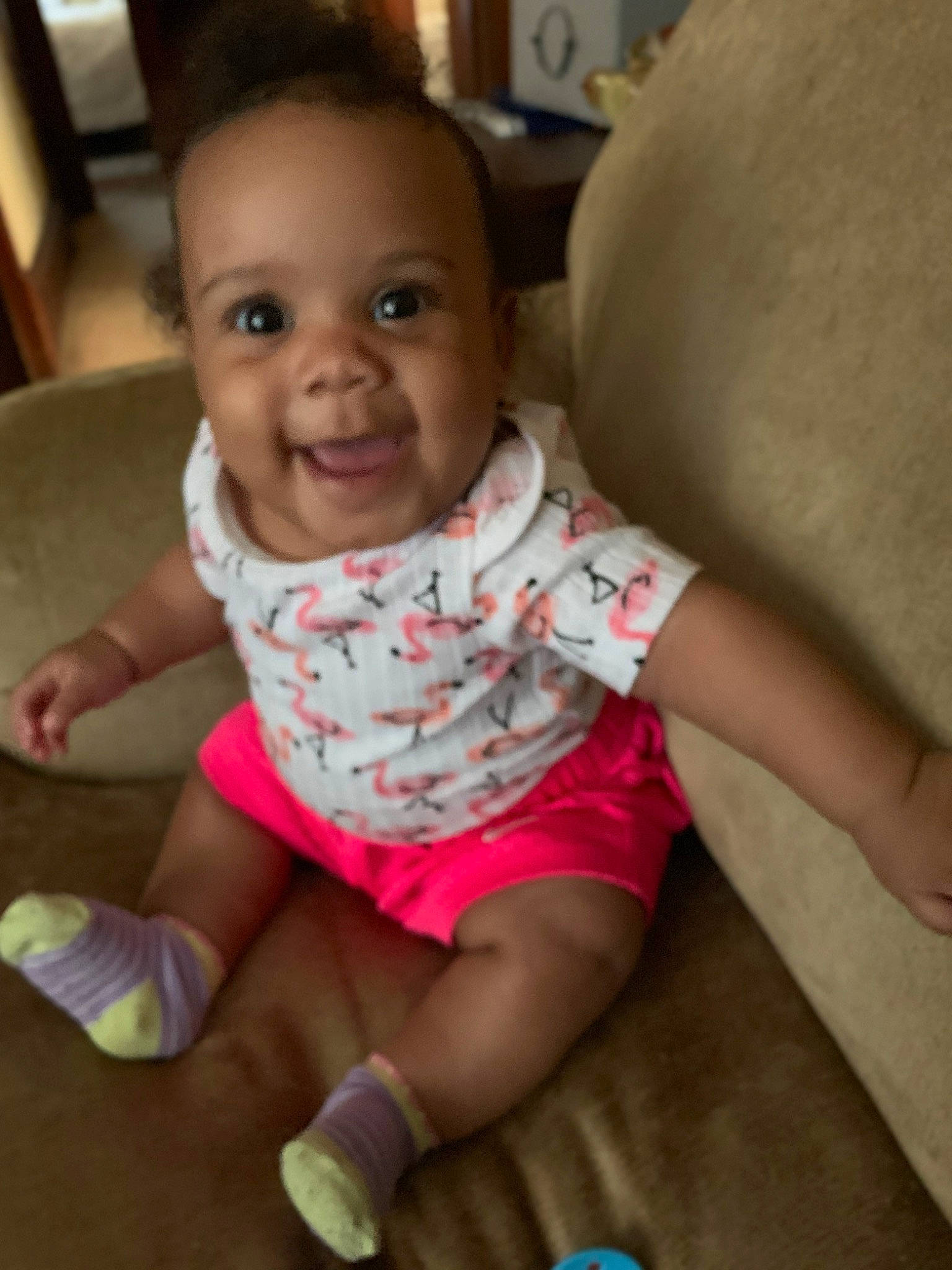 Molly is registered to the contest to win money with this photo: baby_toddler_clothing, cheek, chin, comfort, eye, face, finger, floor, head, iris, joint, joy, lip, mouth, neck, nose, person, shoulder, skin, sleeve