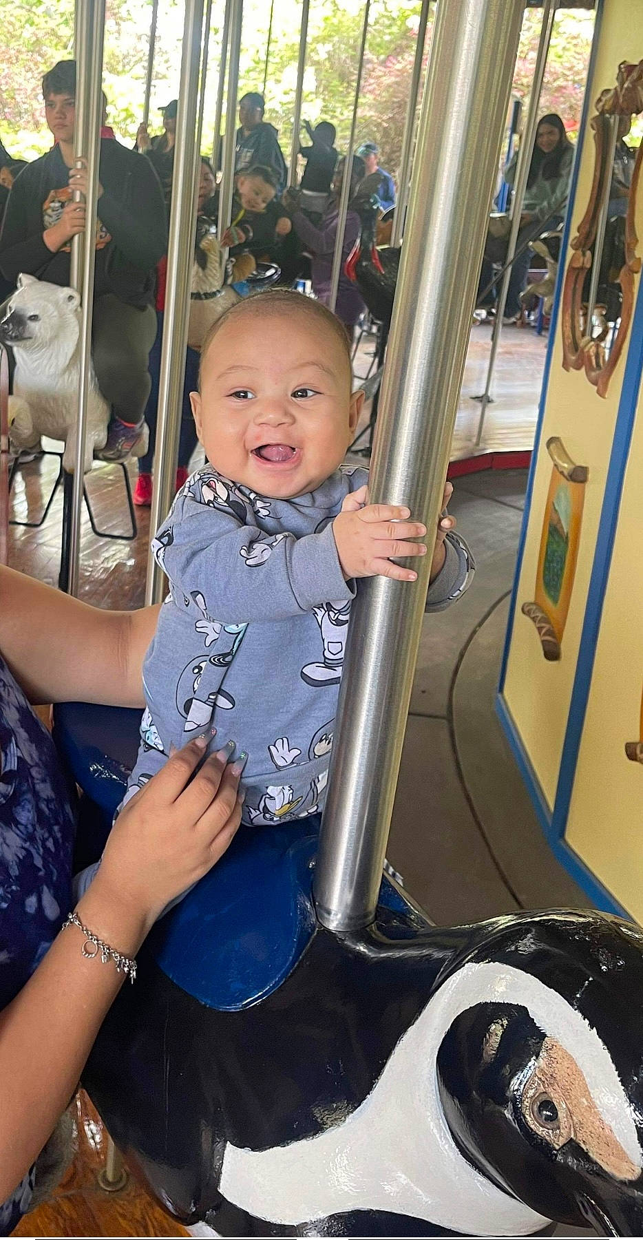 Ace is registered to the contest to win money with this photo: auto_part, baby, baby_products, baby_toddler_clothing, chair, child, city, electric_blue, event, fun, joint, leisure, machine, motor_vehicle, person, recreation, service, shoulder, sitting, smile