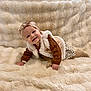 Camila a rejoint le concours — aidez-le/la à gagner de superbes lots ! baby, blanket, child, cozy, crawling, cute, fur, happy, headband, indoor, infant, patterned_skirt, person, plush, smiling, soft, sweater, tights, vest, warm