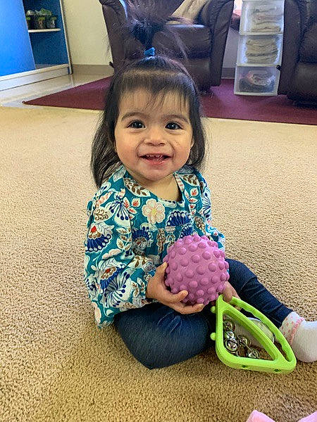 Candelaria joined the competition — help win amazing prizes! baby, baby_playing_with_toys, baby_toddler_clothing, blue, eye, finger, flooring, fun, hair, hand, happy, head, human_body, iris, joy, person, shoulder, skin, sleeve, smile