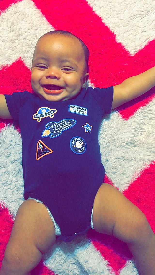 Jaxtyn joined the competition — help win amazing prizes! baby, baby_products, baby_toddler_clothing, cheek, child, cool, face, facial_expression, fun, happy, head, joy, magenta, person, pink, play, product, skin, smile, t_shirt