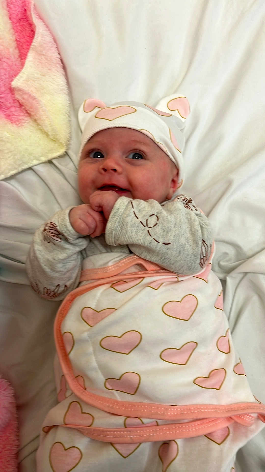 Charlotte is registered to the contest to win money with this photo: baby, bed, blanket, bodypart, bonnet, cap, clothing, face, finger, furniture, glove, hand, hat, head, newborn, person, photography, portrait, quilt, sleeping