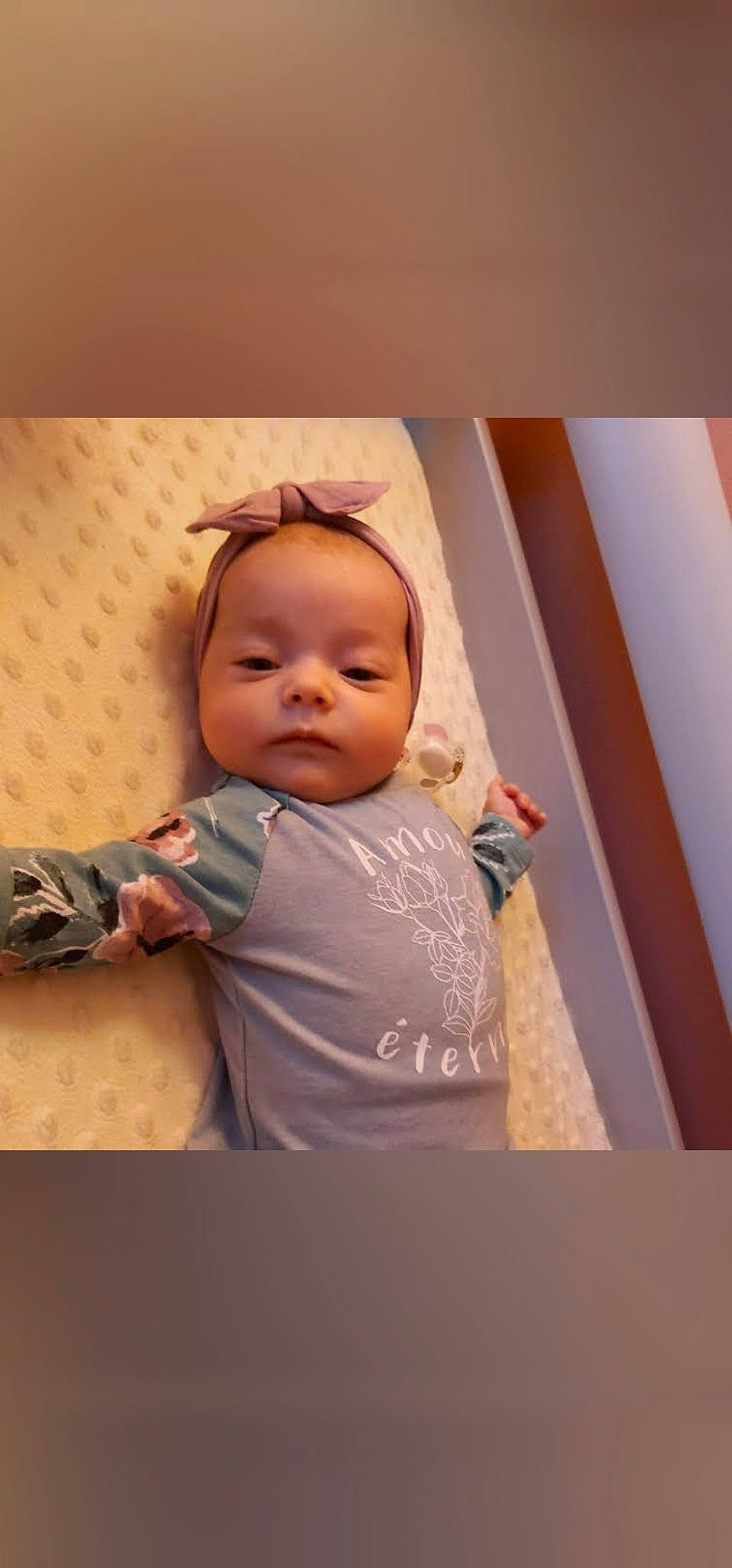 Emma-rose Marcotte participe au concours pour gagner de l'argent avec cette photo : baby, baby_products, baby_toddler_clothing, cheek, child, comfort, fun, happy, iris, linens, neck, nose, person, portrait_photography, room, sitting, skin, sleeve, t_shirt, toddler