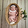 Eïlynn participe au concours pour gagner de l'argent avec cette photo : baby, sleeping, basket, blanket, headband, flower, wooden_floor, infant, cozy, pink, cute, peaceful, newborn, soft_texture, portrait, resting, toddler, decor, woven, floral