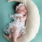Eïlynn participe au concours pour gagner de l'argent avec cette photo : baby, sleeping, crescent_moon_pillow, white_dress, floral, headband, soft_texture, peaceful, cute, infant, resting, blue_background, adorable, newborn, portrait, child, soft_lighting, cozy, toddler, cute_outfit