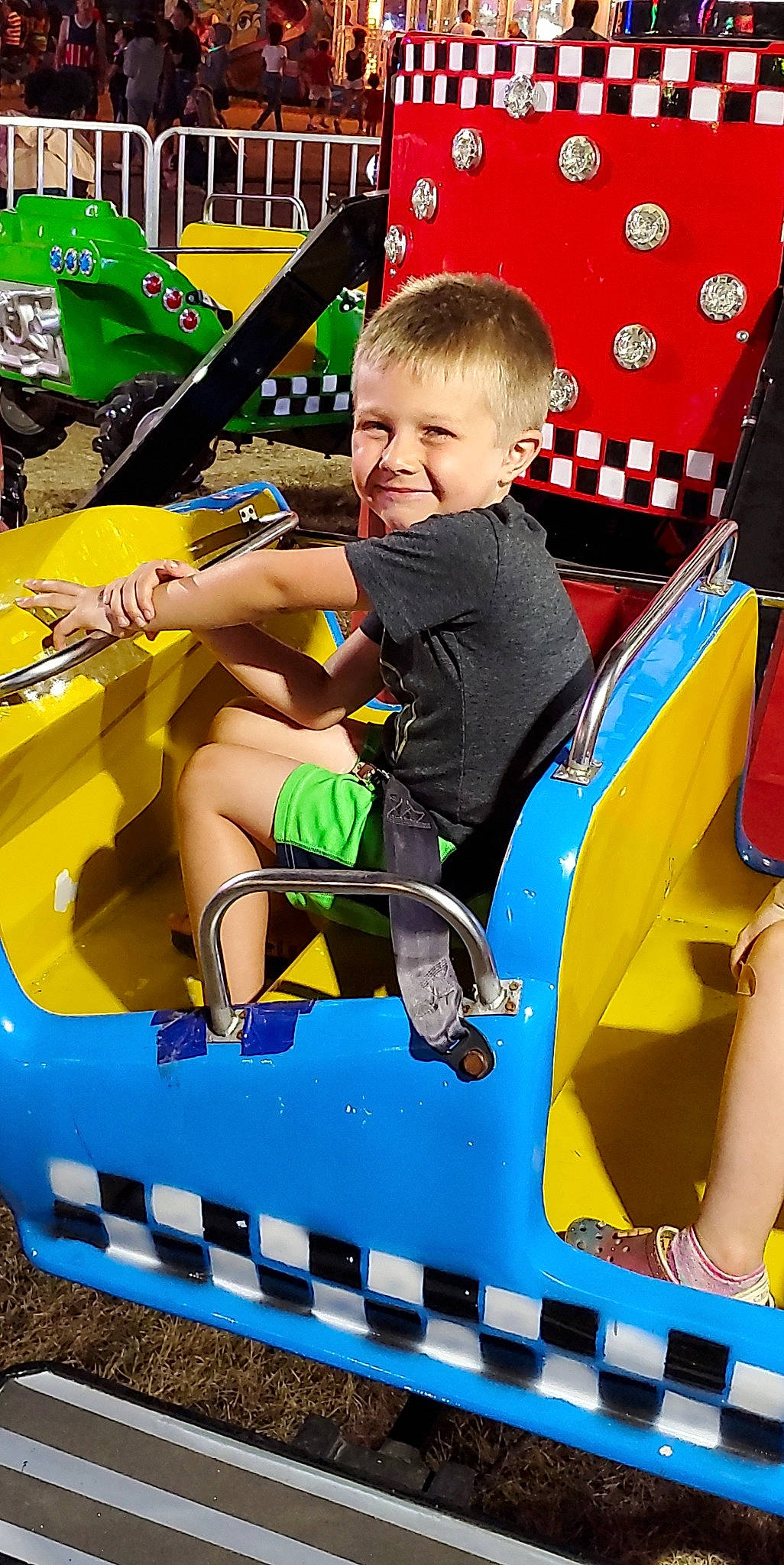 Ricky joined the competition — help win amazing prizes! amusement_ride, baby, baby_toddler_clothing, blue, child, chute, fun, green, happy, joy, leisure, motor_vehicle, outdoor_play_equipment, outdoor_recreation, person, photograph, playground, product, recreation, smile