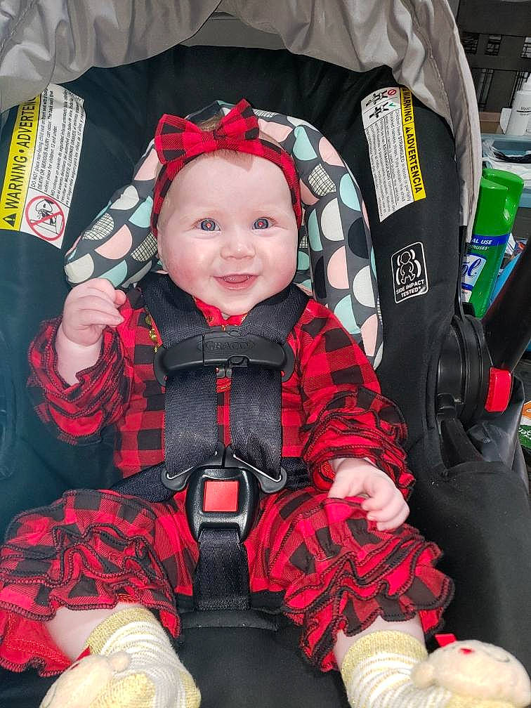 Briley is registered to the contest to win money with this photo: auto_part, baby, baby_carriage, baby_in_car_seat, baby_products, car_seat, car_seat_cover, child, headwear, person, product, seat_belt, toddler