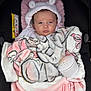 Lottie-Mae joined the competition — help win amazing prizes! baby, blanket, car_seat, child, cute, face, hat, indoors, knit, light, person, portrait, pink, resting, sleeping_bag, soft, toddler, warm, white, young