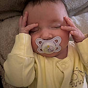 Lottie-Mae joined the competition — help win amazing prizes! baby, infant, pacifier, sleeping, yellow_onesie, elephant_print, hands_on_head, soft_blanket, cozy, closeup, face, closed_eyes, cute, newborn, child, indoor, portrait, peaceful, resting, human