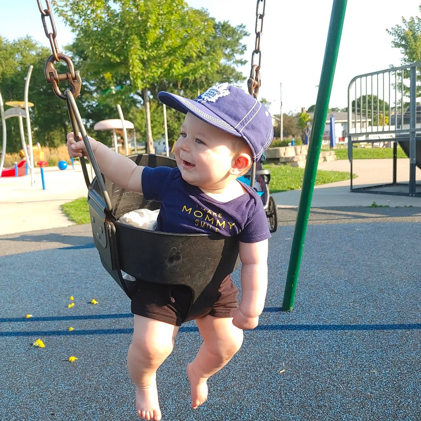 Laine joined the competition — help win amazing prizes! baby, baby_toddler_clothing, child, city, electric_blue, event, fun, grass, happy, hat, headwear, leisure, outdoor_play_equipment, person, plant, play, playground, recreation, sky, swing