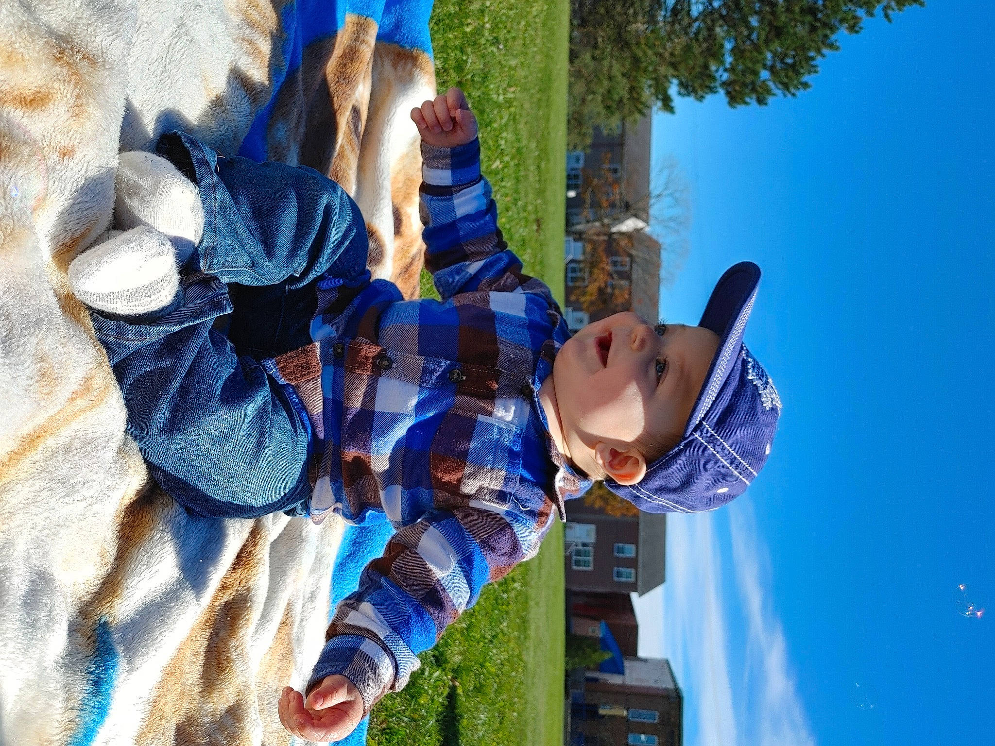 Laine joined the competition — help win amazing prizes! electric_blue, fun, gesture, grass, happy, hat, headwear, leisure, people_in_nature, person, plant, recreation, sky, smile, spring, sun_hat, toddler, tourism, travel, tree