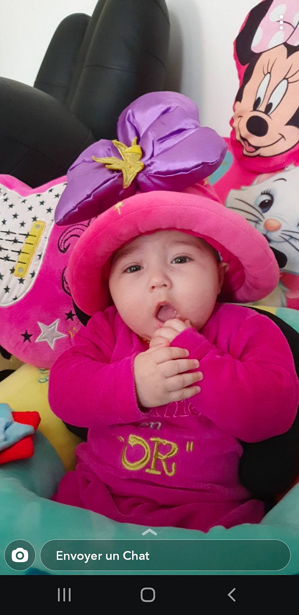 Lila participe au concours pour gagner de l'argent avec cette photo : baby, baby_toddler_clothing, beanie, cap, cheek, child, event, face, fashion_accessory, fun, happy, headgear, headwear, knit_cap, leisure, magenta, person, pink, playing_with_kids, recreation