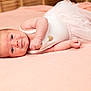 Ariana participe au concours pour gagner de l'argent avec cette photo : adorable, baby, blanket, clothing, cute, fabric, face, footwear, hand, heart, indoor, infant, lying_down, newborn, pink, portrait, skin, soft, sweet, tutu