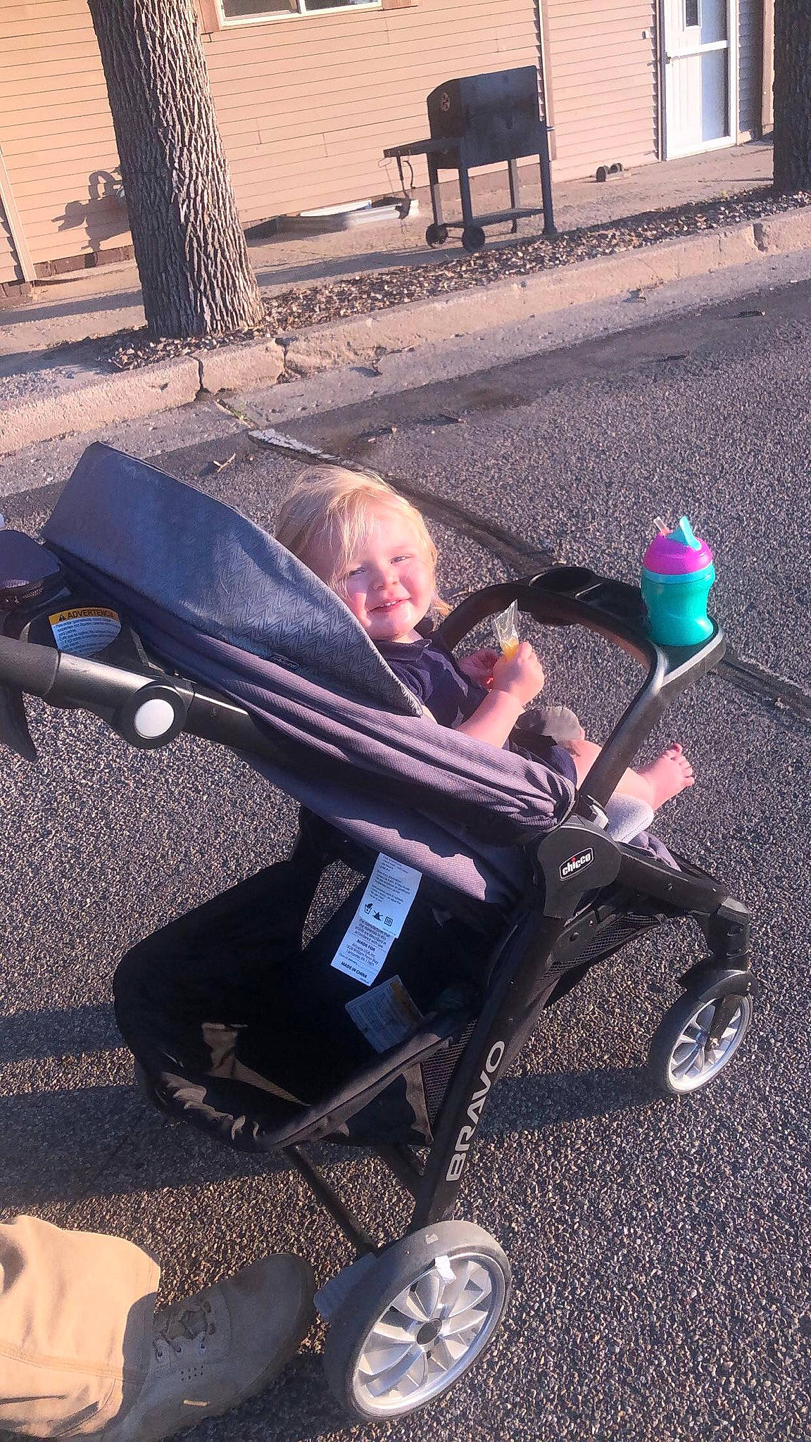 Renesmae joined the competition — help win amazing prizes! auto_part, automotive_tire, baby, baby_carriage, child, comfort, electric_blue, joy, lap, leg, leisure, person, recreation, shoe, sitting, smile, sneakers, tints_and_shades, tire, toddler