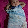Raina joined the competition — help win amazing prizes! baby, sleeping, infant, portrait, blanket, swaddled, bed, bedding, magenta, blue, face, eyes_closed, peaceful, indoors, lying_down, arm, hand, newborn, cozy, photograph