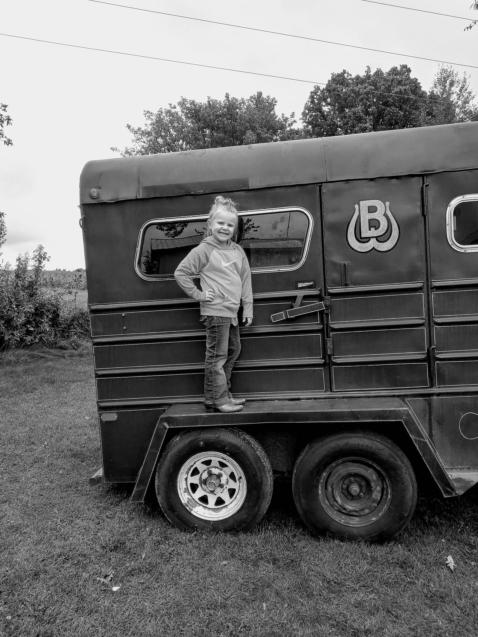 Margaret joined the competition — help win amazing prizes! black_and_white, car, commercial_vehicle, joy, mode_of_transport, monochrome, motor_vehicle, person, photography, trailer, transport, travel_trailer, truck, vehicle