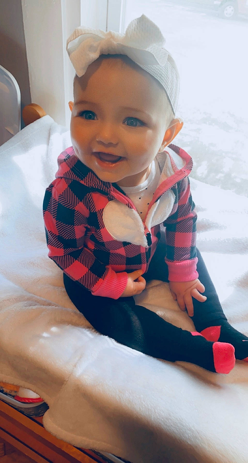Hadlee is registered to the contest to win money with this photo: arm, baby, baby_toddler_clothing, comfort, cool, face, finger, happy, head, human_body, knee, mouth, person, pink, skin, sleeve, smile, textile, thigh, toddler