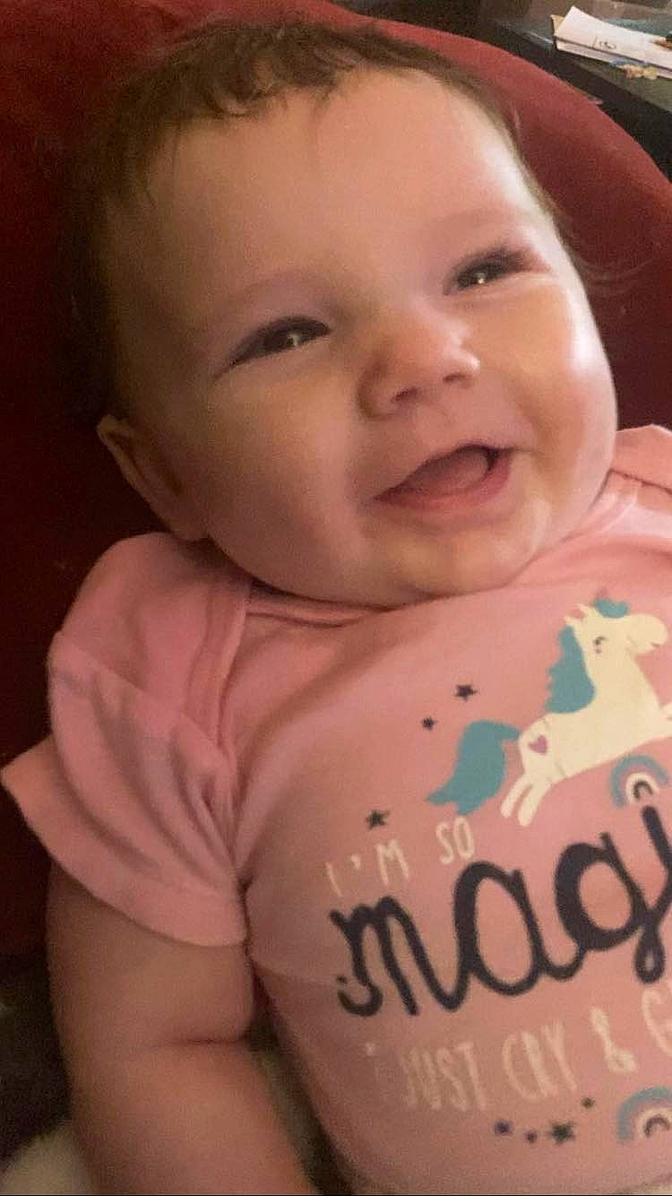 Autumn is registered to the contest to win money with this photo: baby, baby_toddler_clothing, cheek, chin, eye, eyebrow, face, facial_expression, forehead, head, human_body, iris, lip, mammal, mouth, neck, nose, person, skin, sleeve