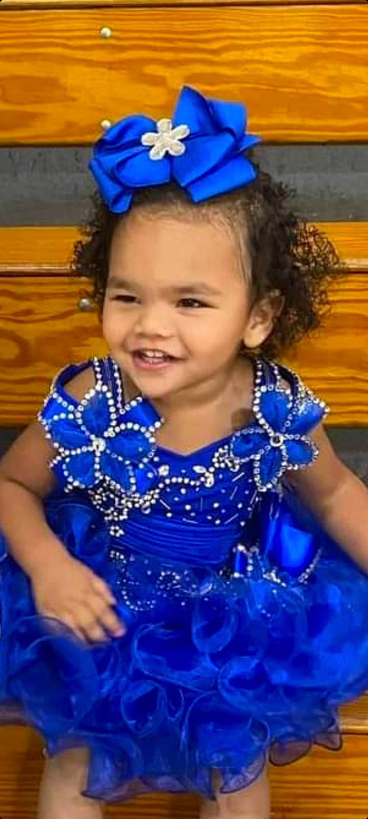 Maci is registered to the contest to win money with this photo: baby_toddler_clothing, beauty, blue, child, dress, electric_blue, event, fashion_accessory, fun, hairstyle, happy, hat, headpiece, iris, jewellery, joy, magenta, person, purple, smile