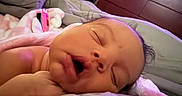 Serenity joined the competition — help win amazing prizes! newborn, baby, infant, sleeping, yawning, face, portrait, bed, blanket, bedding, bedroom, cozy, indoor, lying_down, close_up, relaxed, peaceful, soft_lighting, purple_lighting, photography