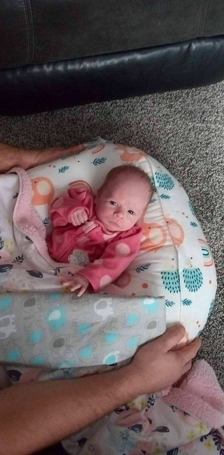 Mari'Lynn is registered to the contest to win money with this photo: baby, baby_products, baby_toddler_clothing, bedding, cheek, child, comfort, finger, foot, hand, linens, nail, person, pink, product, skin, stomach, textile, thumb, toddler