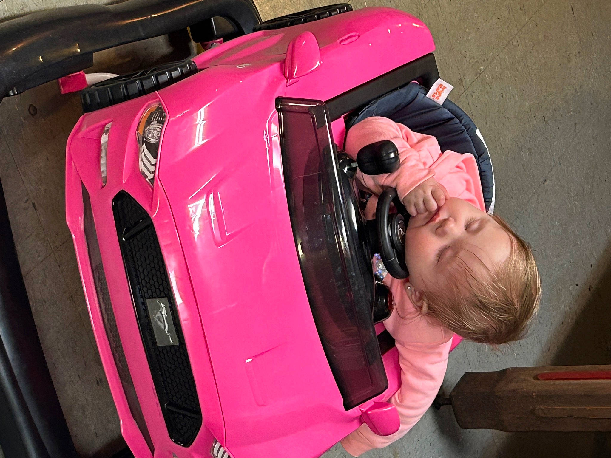 Kinsley joined the competition — help win amazing prizes! audio_equipment, automotive_design, automotive_exterior, automotive_lighting, automotive_tail_brake_light, automotive_tire, automotive_wheel_system, bumper, car, fender, helmet, hood, motor_vehicle, person, personal_luxury_car, personal_protective_equipment, pink, tire, vehicle, vehicle_door