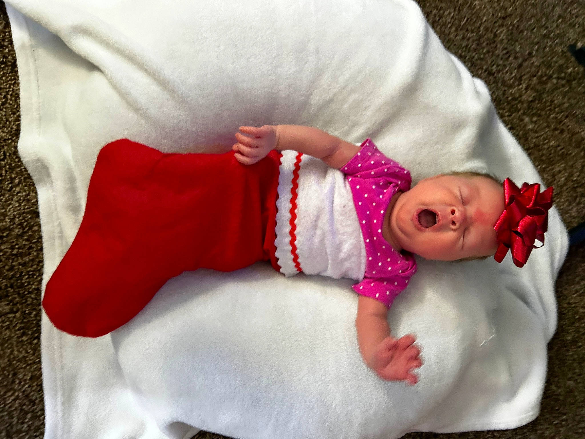 Madison joined the competition — help win amazing prizes! arm, baby, baby_sleeping, baby_toddler_clothing, child, comfort, finger, hand, headwear, human_body, joint, leg, linens, pattern, person, pink, skin, sleeve, sock, textile