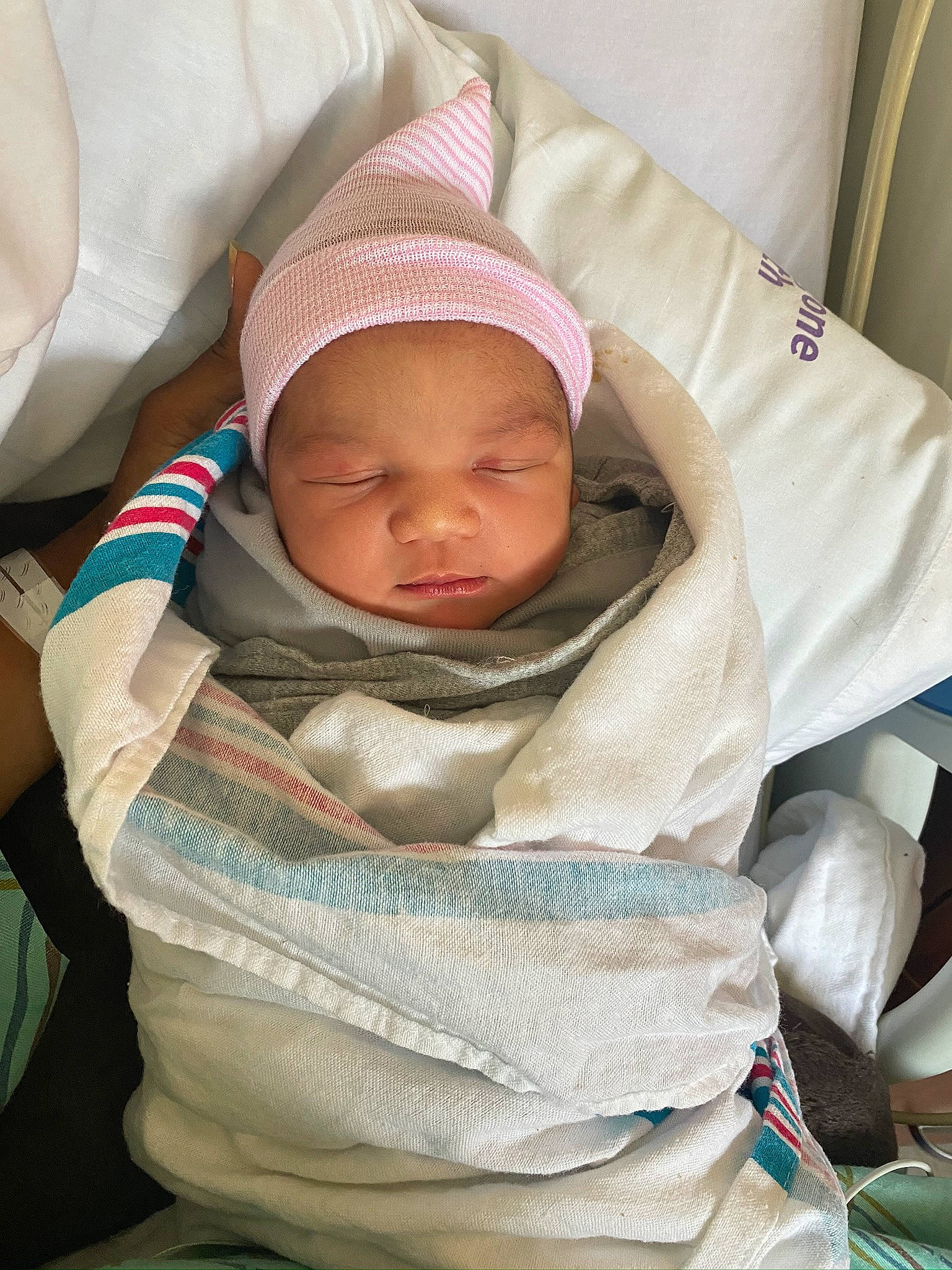 Janiyah is registered to the contest to win money with this photo: baby, baby_carriage, baby_products, baby_safety, baby_sleeping, baby_toddler_clothing, cap, cheek, child, comfort, eyebrow, head, headwear, infant_bed, linens, mouth, person, sitting, skin, sleeve